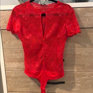 Brand new red lacy G string body suit